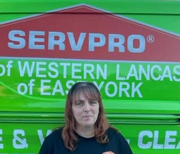 Stacey Beaner in front of SERVPRO van